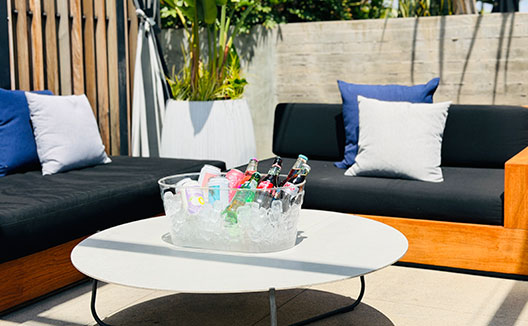 Spotlight Cabana at The Scene at Kimpton Everly Hotel Rooftop Pool with bucket of beverages